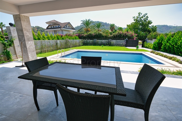 Вилла планировки 6+1 в районе Кемер - Анталия 