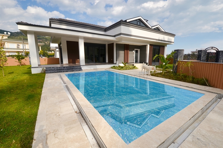 Виллы планировки 4+2 и 9+3 в районе Кемер - Анталия