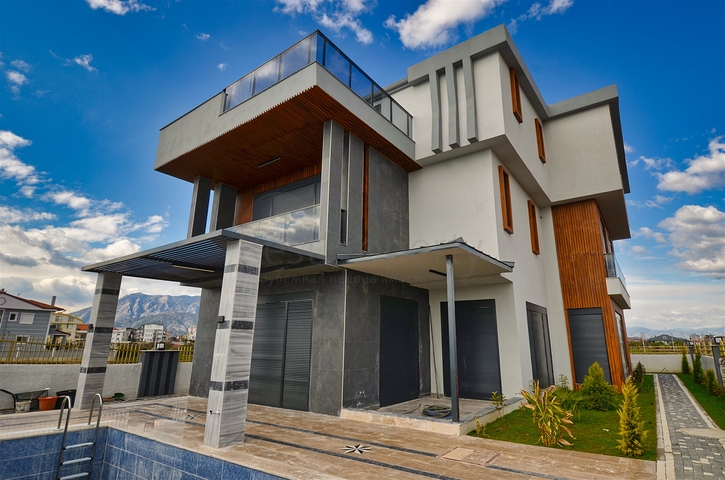 Вилла планировки 7+2 в районе Дошемеалты - Анталия