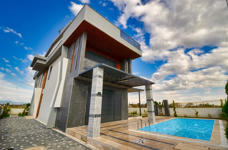 Вилла планировки 7+2 в районе Дошемеалты - Анталия