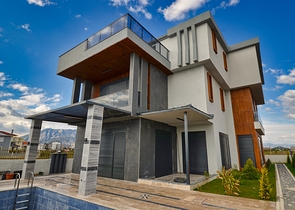 Вилла планировки 7+2 в районе Дошемеалты - Анталия