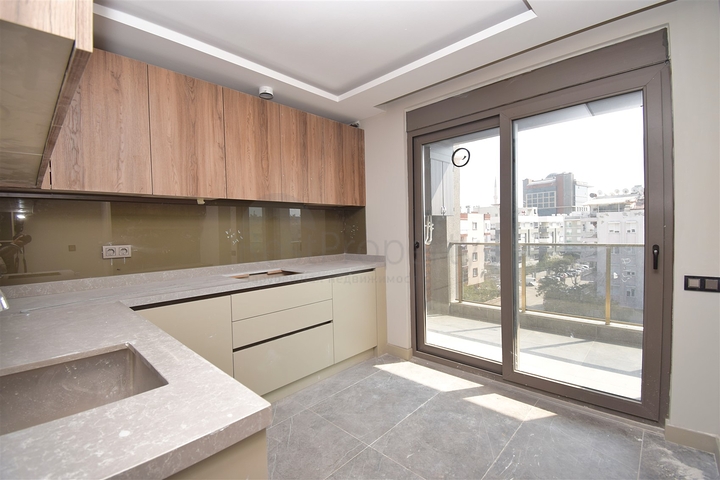 Квартиры планировки 4+1 в микрорайоне Кызылтопрак - Анталия 