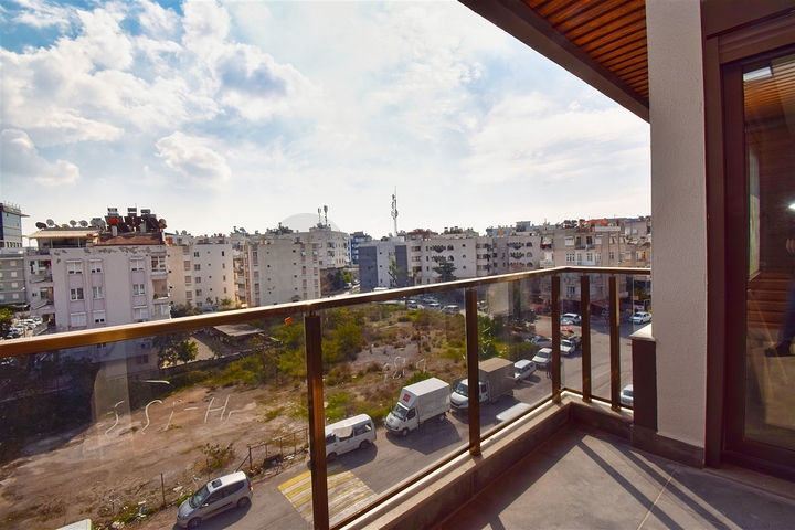 Квартиры планировки 4+1 в микрорайоне Кызылтопрак - Анталия 