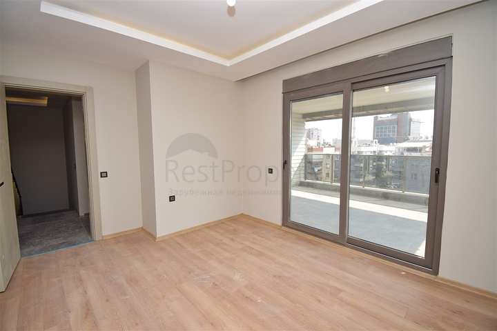 Квартиры планировки 4+1 в микрорайоне Кызылтопрак - Анталия 