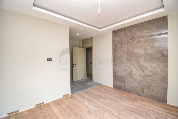 Квартиры планировки 4+1 в микрорайоне Кызылтопрак - Анталия 