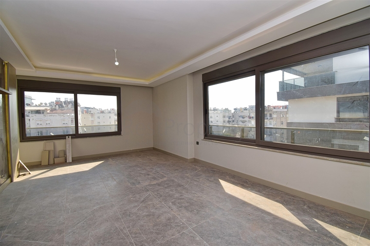 Квартиры планировки 4+1 в микрорайоне Кызылтопрак - Анталия 