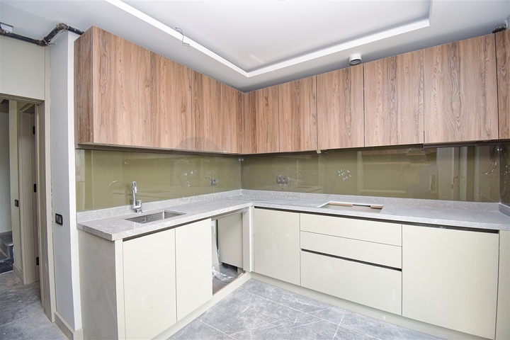 Квартиры планировки 4+1 в микрорайоне Кызылтопрак - Анталия 