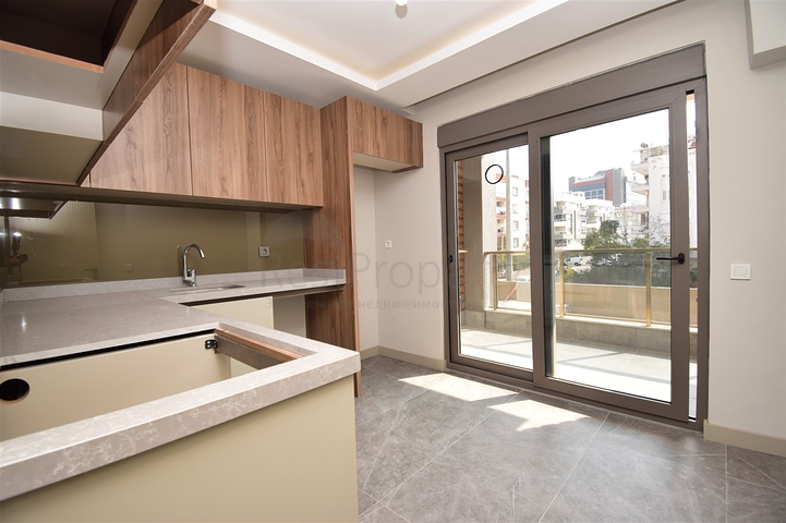 Квартиры планировки 4+1 в микрорайоне Кызылтопрак - Анталия 