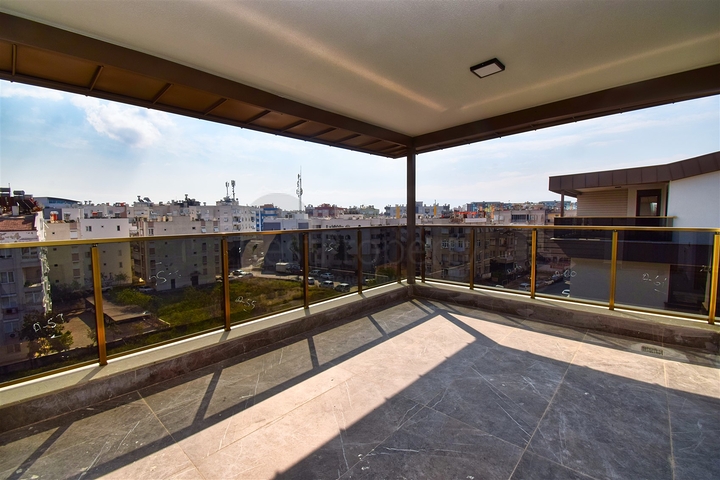 Квартиры планировки 4+1 в микрорайоне Кызылтопрак - Анталия 