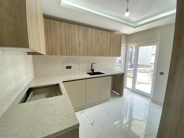 Квартира планировки 3+1 в микрорайоне Гюрсу - Анталия 