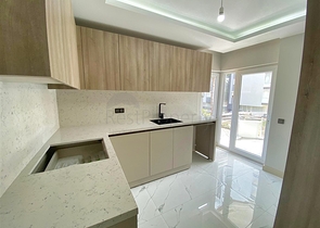 Квартира планировки 3+1 в микрорайоне Гюрсу - Анталия 