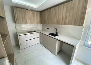 Квартира планировки 3+1 в микрорайоне Гюрсу - Анталия 