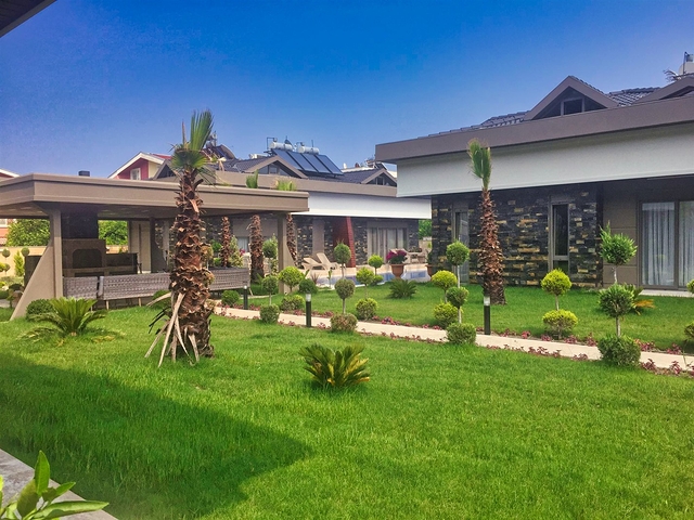 Вилла планировки 4+1 в микрорайоне Асланбуджак - Анталия