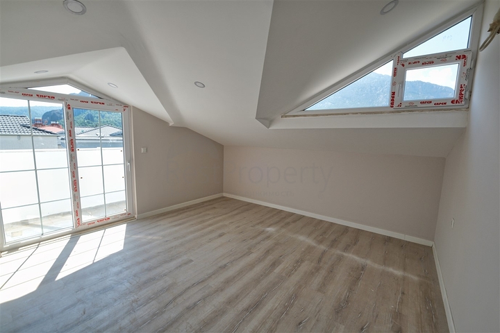 Квартиры планировки 1+1 и 3+1 в районе Кемер - Анталия 