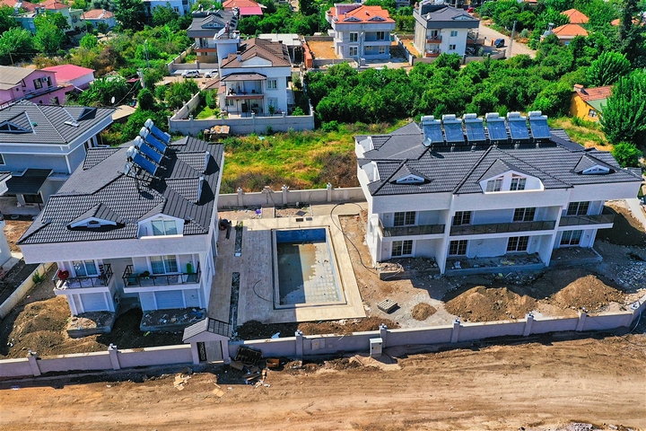 Квартиры планировки 1+1 и 3+1 в районе Кемер - Анталия 