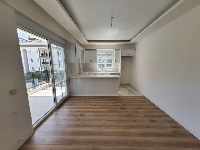 Квартира планировки 3+1 в микрорайоне Асланбуджак - Анталия 