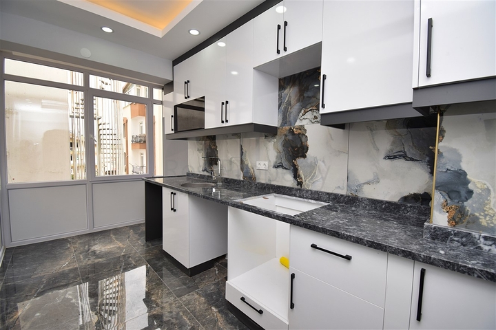 Квартира планировки 3+1 в микрорайоне Дутлубахче - Анталия