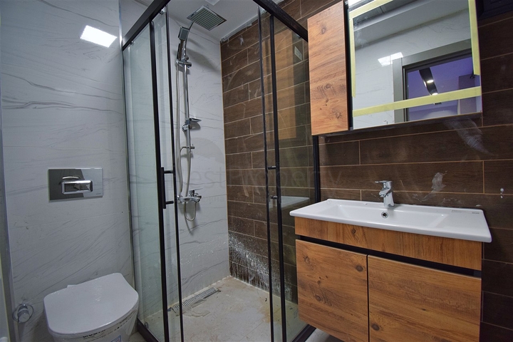 Квартира планировки 3+1 в центре города Анталия 