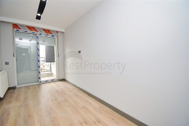 Квартира планировки 3+1 в центре города Анталия 