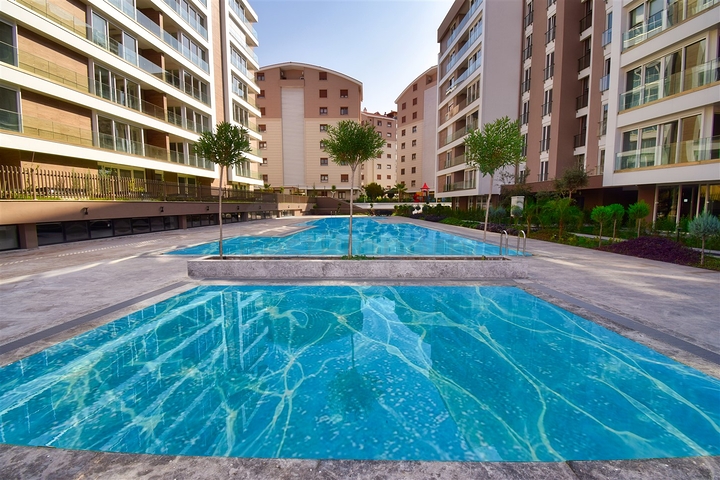 Квартира планировки 3+1 в микрорайоне Унджалы - Анталия