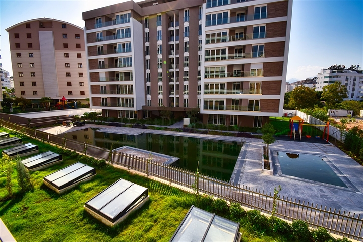 Квартира планировки 3+1 в микрорайоне Унджалы - Анталия