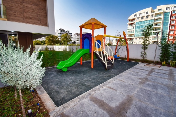 Квартира планировки 3+1 в микрорайоне Унджалы - Анталия