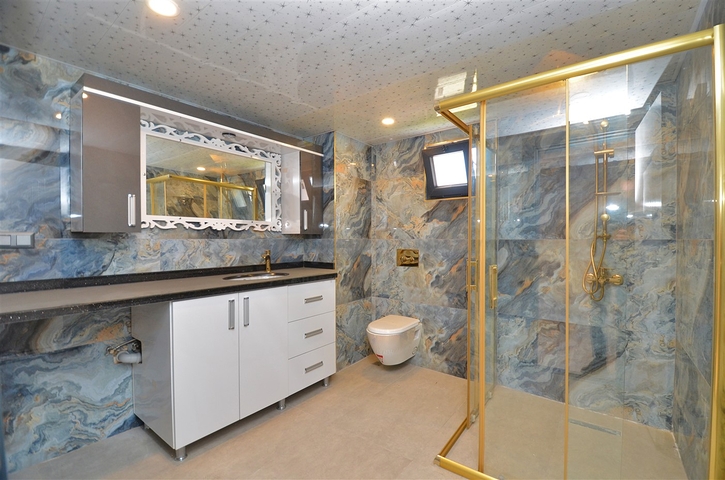 Вилла планировки 6+2 в районе Кемер - Анталия 