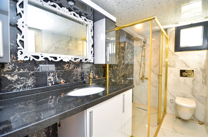 Вилла планировки 6+2 в районе Кемер - Анталия 