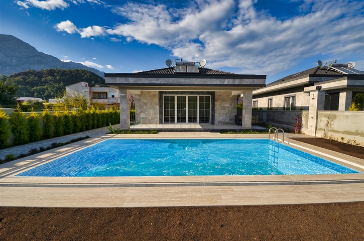 Вилла планировки 6+1 в районе Кемер - Анталия 