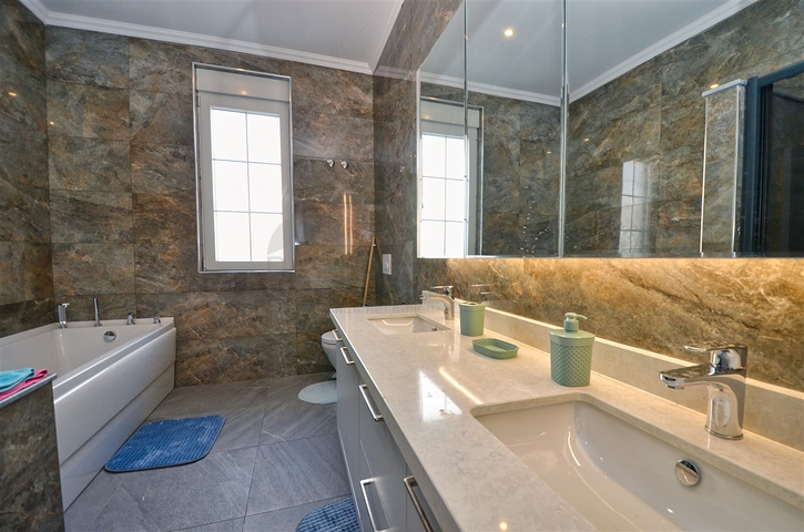 Вилла планировки 6+1 в районе Кемер - Анталия 