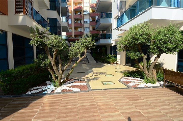 Апартаменты 2+1 в благоустроенном комплексе в Махмутларе