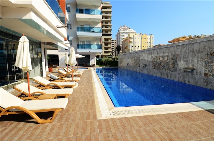 Апартаменты 2+1 в благоустроенном комплексе в Махмутларе