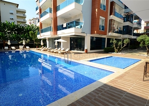 Апартаменты 2+1 в благоустроенном комплексе в Махмутларе