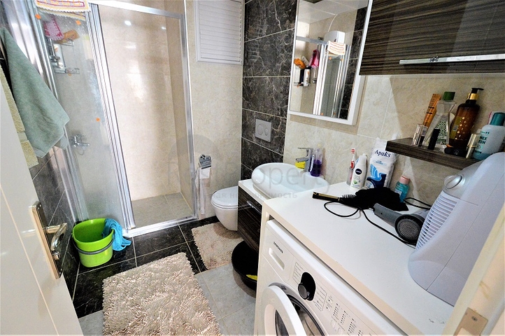 Меблированная квартира 2+1 в комплексе с бассейном в Анталии