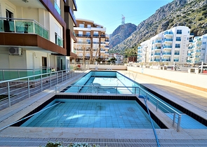 Меблированная квартира 2+1 в комплексе с бассейном в Анталии