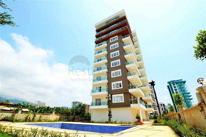 Квартиры в комплексе с бассейном в Махмутларе