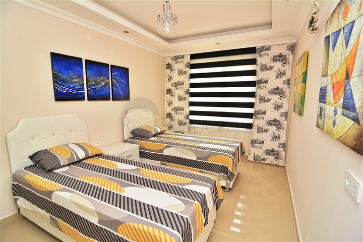 Квартиры в комплексе с бассейном в Махмутларе