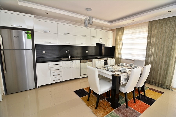 Квартиры в комплексе с бассейном в Махмутларе