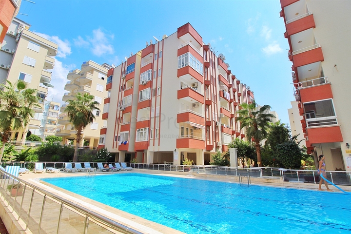 Меблированные апартаменты 1+1 в районе Махмутлар