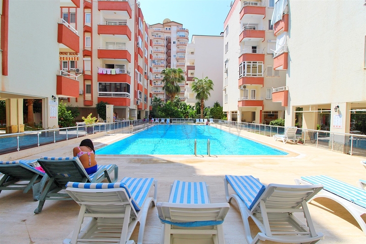 Меблированные апартаменты 1+1 в районе Махмутлар