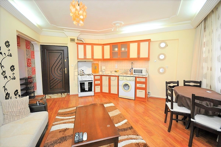 Меблированные апартаменты 1+1 в районе Махмутлар