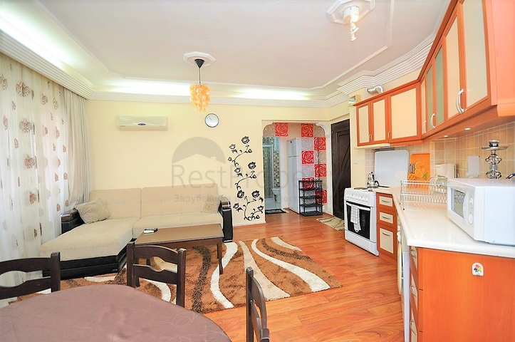 Меблированные апартаменты 1+1 в районе Махмутлар