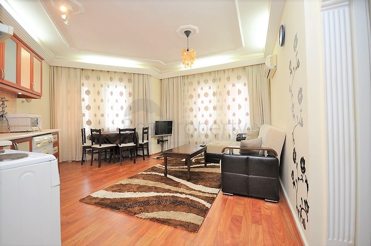 Меблированные апартаменты 1+1 в районе Махмутлар