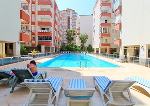 Меблированные апартаменты 1+1 в районе Махмутлар