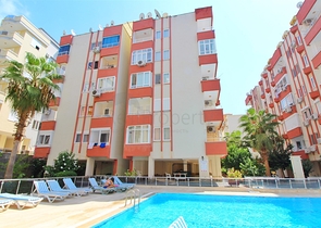 Меблированные апартаменты 1+1 в районе Махмутлар