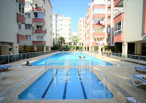 Меблированные апартаменты 1+1 в районе Махмутлар