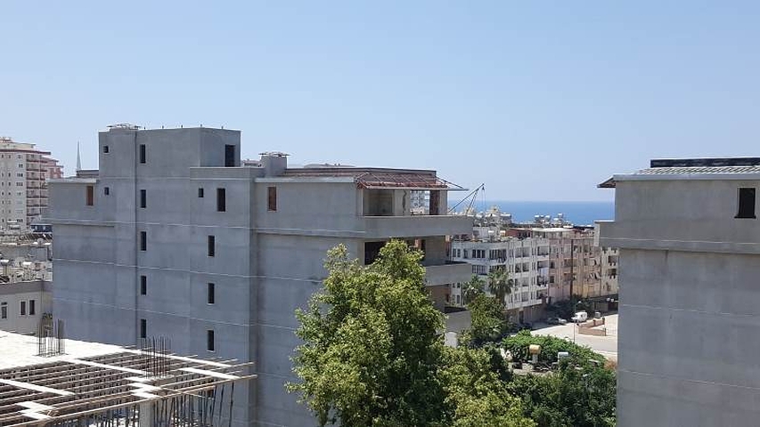 Благоустроенные апартаменты 2+1 в центре Махмутлара