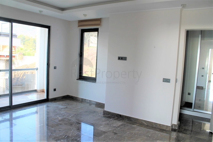 Апартаменты с завораживающим видом в центре Алании