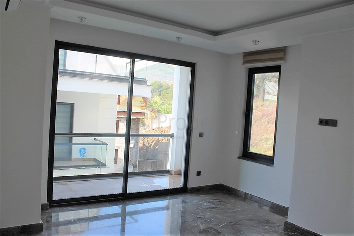 Апартаменты с завораживающим видом в центре Алании