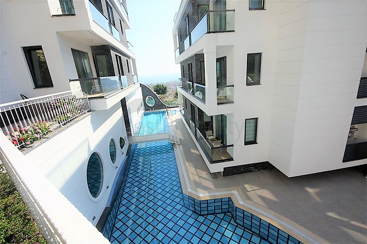 Апартаменты с завораживающим видом в центре Алании